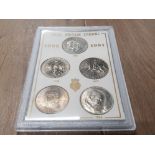 A CASED 5 PIECE UNCIRCULATED SET OF BRITISH CROWNS DATING FROM 1965 TO 1981