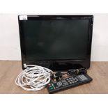 SMALL M AND S 13 INCH TV WITH ATTATCHED WALL FITTING AND LEADS PLUS REMOTE