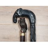 CARVED AFRICAN HARDWOOD WALKING STICK WITH CARVED HORN ELEPHANT HANDLE TOGETHER WITH ANOTHER WALKING