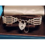 HALLMARKED SILVER FOUR BAR GATE BRACELET WITH PADLOCK 14.2G