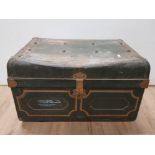 A VINTAGE TIN METAL TRUNK