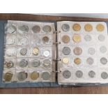 ALBUM CONTAINING A COLLECTION OF OVER 300 COINS MAINLY FROM ISRAEL BUT INCLUDING SOME EURO COINS