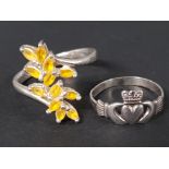 SILVER CLADDAGH RING WITH HANDS CLASPING HEART SIZE I TOGETHER WITH SILVER AND YELLOW STONE