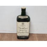 A WHITE AND BLACK LABELLED 70% PROOF BOTTLE OF GORDONS GENUINE SPECIAL DRY LONDON GIN