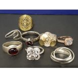 8 LADIES DRESS RINGS INCLUDES A FANTASTIC CZ FLOWER RING AND RED STONE RINGS ETC