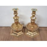 PAIR OF HEAVY CONTINENTAL POSSIBLY DUTCH CANDLESTICKS WITH 6 SIDED BASE AND SKIRTS