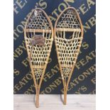 A PAIR OF WOODEN SNOW SHOES