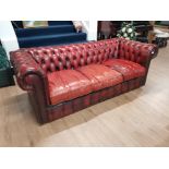 WELL PRESENTED OX BLOOD RED LEATHER CHESTERFIELD THREE SEATER SOFA