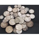 BAG CONTAINING SILVER COINS FROM AROUND THE WORLD 8 OUNCES IN WEIGHT