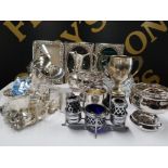 A LOT OF SILVER PLATED ITEMS INCLUDES CRUET SET AND TEAPOT ETC
