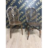 A PAIR OF OAK WHEEL BACK DINING CHAIRS