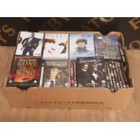 BOX OF DVDS INCLUDING SKYFALL GEORGE HARRISON AND GONE WITH THE WIND