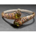 GOLD PLATED SILVER MULTI GEMSTONE CROSS OVER BANGLE 28.2G GROSS WEIGHT