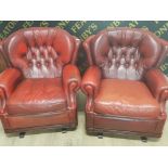 2 OX BLOOD RED LEATHER ROCKING CHAIRS