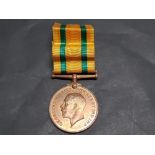GEORGE V TERRITORIAL WAR MEDAL IN BRONZE 1914-19 FOR VOLUNTARY OVERSEAS SERVICE AWARDED TO 777