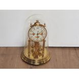 BRASS KIENINGER AND UBERGFELL GERMAN ANNIVERSARY CLOCK WITH GLASS DOME SHADE