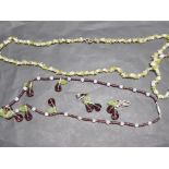 PERIDOT AND ROSE QUARTZ NECKLET AND BRACELET PLUS PURPLE AND GREEN BEADED NECKLET AND MATCHING