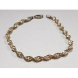 LADIES STAMPED 925 SILVER AND GILT TWIRL BRACELET