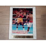 EVANDER HOLYFIELD 8X10 SIGNED COLOURED ACTION PHOTOGRAPH AS HEAVYWEIGHT CHAMPION