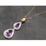 9CT YELLOW GOLD DIAMOND AND AMETHYST PENDANT ON 9CT GOLD CHAIN, GROSS WEIGHT 2.2G