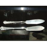 A VICTORIAN SILVER BUTTER KNIFE BY JOSIAH WILLIAMS AND CO LONDON 1897 AND A GEORGE VI BUTTER KNIFE