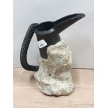 A 10 1/2 INCH ROCK SERIES JUG BY KEITH BOOTH THE HANDLE MADE TO LOOK LIKE A FLEXIBLE BLACK HOSE