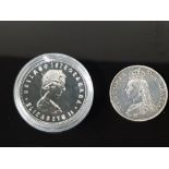 A VICTORIAN SILVER FLORIN 1887 AND AN ELIZABETH II CANADIAN DOLLAR 1978