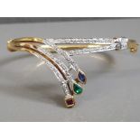 18CT YELLOW GOLD ORNATE DIAMOND BANGLE WITH RUBY, SAPPHIRE AND EMERALD STONES 22.3G