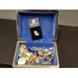 BLUE JEWELLERY BOX CONTAINING ASSORTED GOLD PLATED JEWELLERY AND SWAROVSKI LION PIN