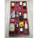 TRAY OF VINTAGE PHOTOGRAPHIC DEVELOPING TINS BOTTLES VARIOUS CLAMPS AND CAMERA HOLDERS ETC