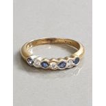 18CT GOLD SAPPHIRE AND DIAMOND 1/2 ETERNITY RING