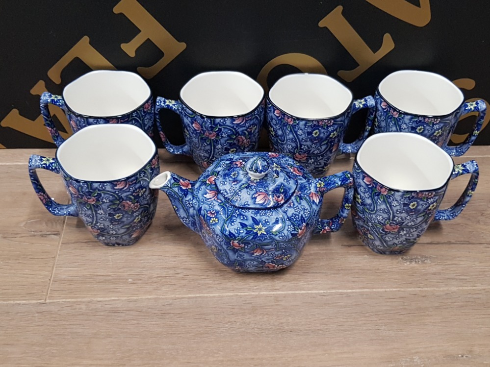 A SET OF 6 RINGTONS CUPS WITH MATCHING TEAPOT