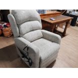 UPHOLSTERED ELECTRIC RECLINING ARM CHAIR