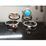 4 STERLING SILVER RINGS 15.1GRAMS