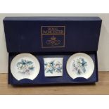 A BOXED 3 PIECE SET OF ROYAL WORCESTER FINE BONE CHINA