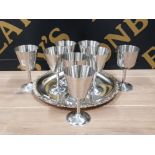 A SILVER PLATED SERVING TRAY TOGETHER WITH 8 STAINLESS STEEL GOBLETS