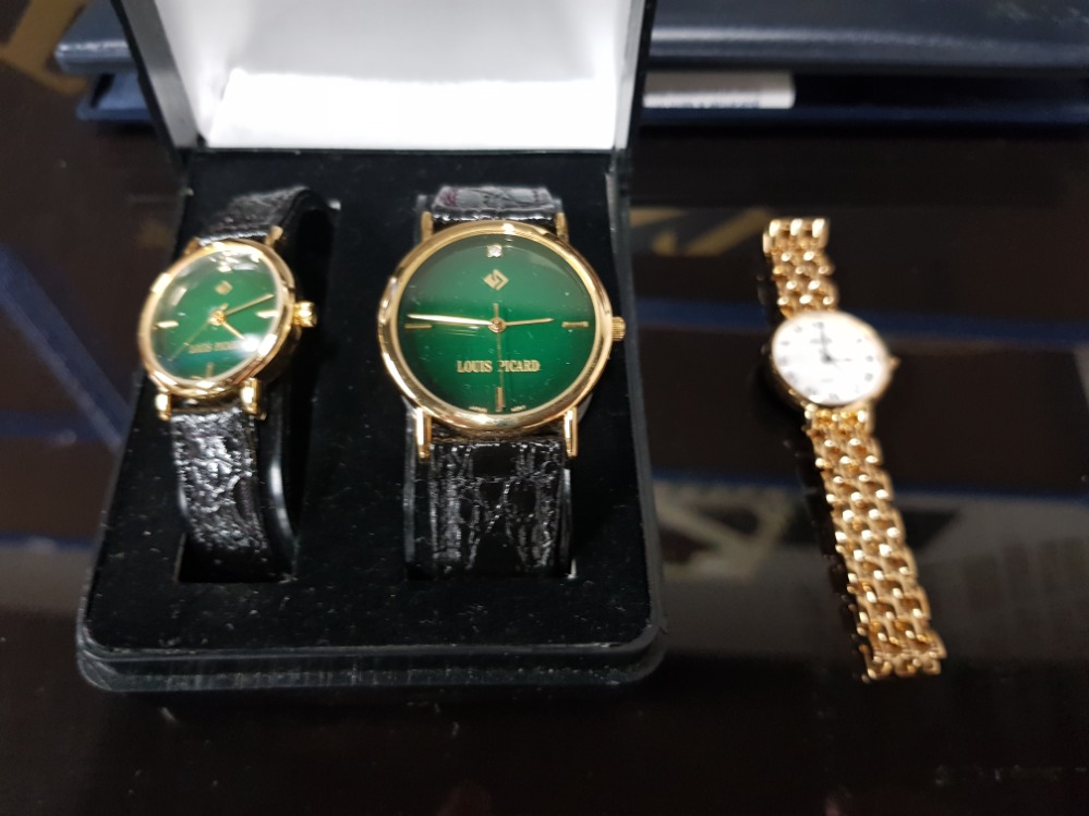 A LADIES AND GENTS LOUIS PICARD WRISTWATCH AND AN AVIA GOLD COLOURED LADIES WRISTWATCH BOTH BOXED