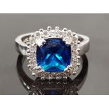 SILVER AN BLUE AND WHITE CZ RING 3.5G SIZE N1/2