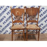 A SET OF 3 PLUS 1 CARVED ELM DINING CHAIRS WITH SPINDLE BACKS AND STUDDED SEATS