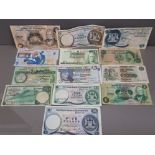 LOT COMPRISING OF 13 DIFFERENT SCOTTISH BANKNOTES INCLUDES TEN ISLE OF MAN, NORTHERN IRELAND AND