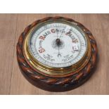 OAK FRAMED WILSON AND GILLIE WALL BAROMETER WITH ROPE EDGING AND BRASS DIAL SLIGHT DAMAGE TO FACE
