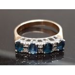 AN 18K YELLOW AND WHITE GOLD SAPPHIRE AND DIAMOND RING STAMPED 750 SIZE P 1/2 3.5G GROSS