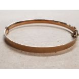 9CT GOLD WITH BRONZE CORE SLIM BANGLE BY LAWSON WARD AND GAMMAGE LAFARMIC HALF ENGINE TURNED