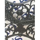 A PAIR OF CAST IRON BENCH ENDS