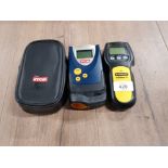 A RYOBI LASER MEASURE WITH CASE AND A STANLEY STUD SENSOR PRO