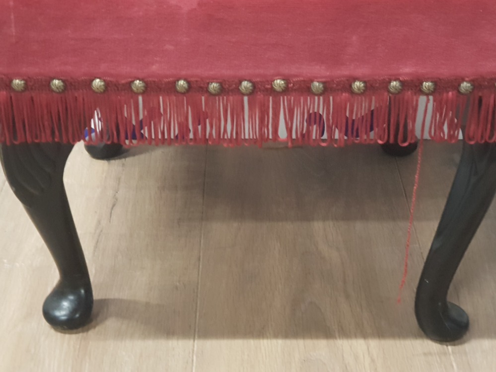 A RED BUTTONED FOOTSTOOL WITH FRILLED EDGES AND METAL STUDDING - Image 2 of 2