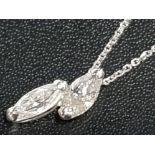 9CT WHITE GOLD 2 MARQUISE DIAMOND PENDANTS APPROXIMATELY .75CT ON CHAIN