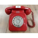 A VINTAGE RED BAKELITE TELEPHONE 746 GNA
