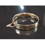 9CT GOLD WITH BRONZE CORE BANGLE BY LAWSON WARD AND GAMMAGE LAGARMIC WITH SAFETY CHAIN HALF ETCHED