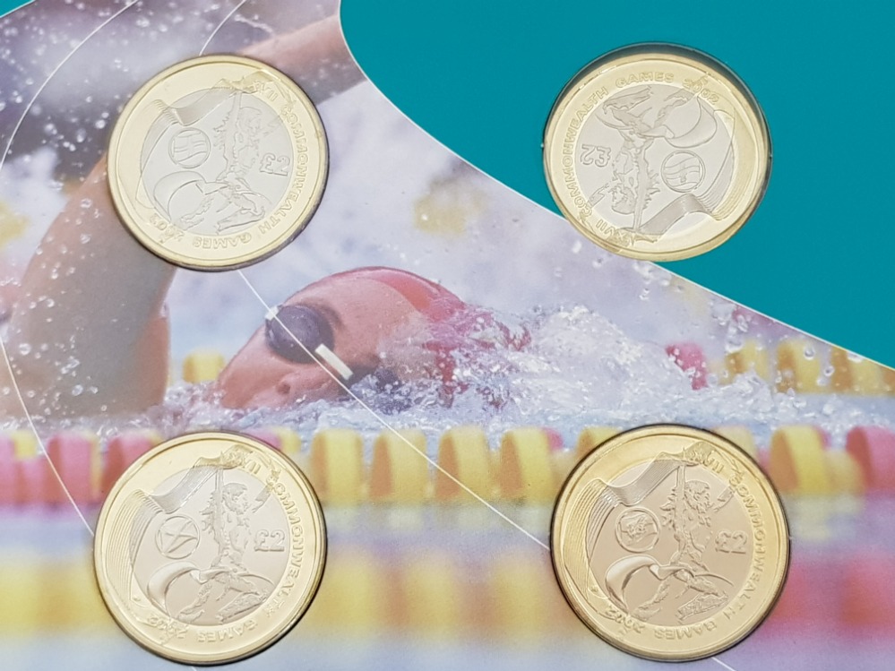 UK ROYAL MINT 2002 COMMONWEALTH GAMES SET OF FOUR 2 POUND COINS IN OFFICIAL UNCIRCULATED PACK,